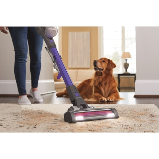 Black+Decker BDPSE1815P-QW vacuuming carpet near a pet