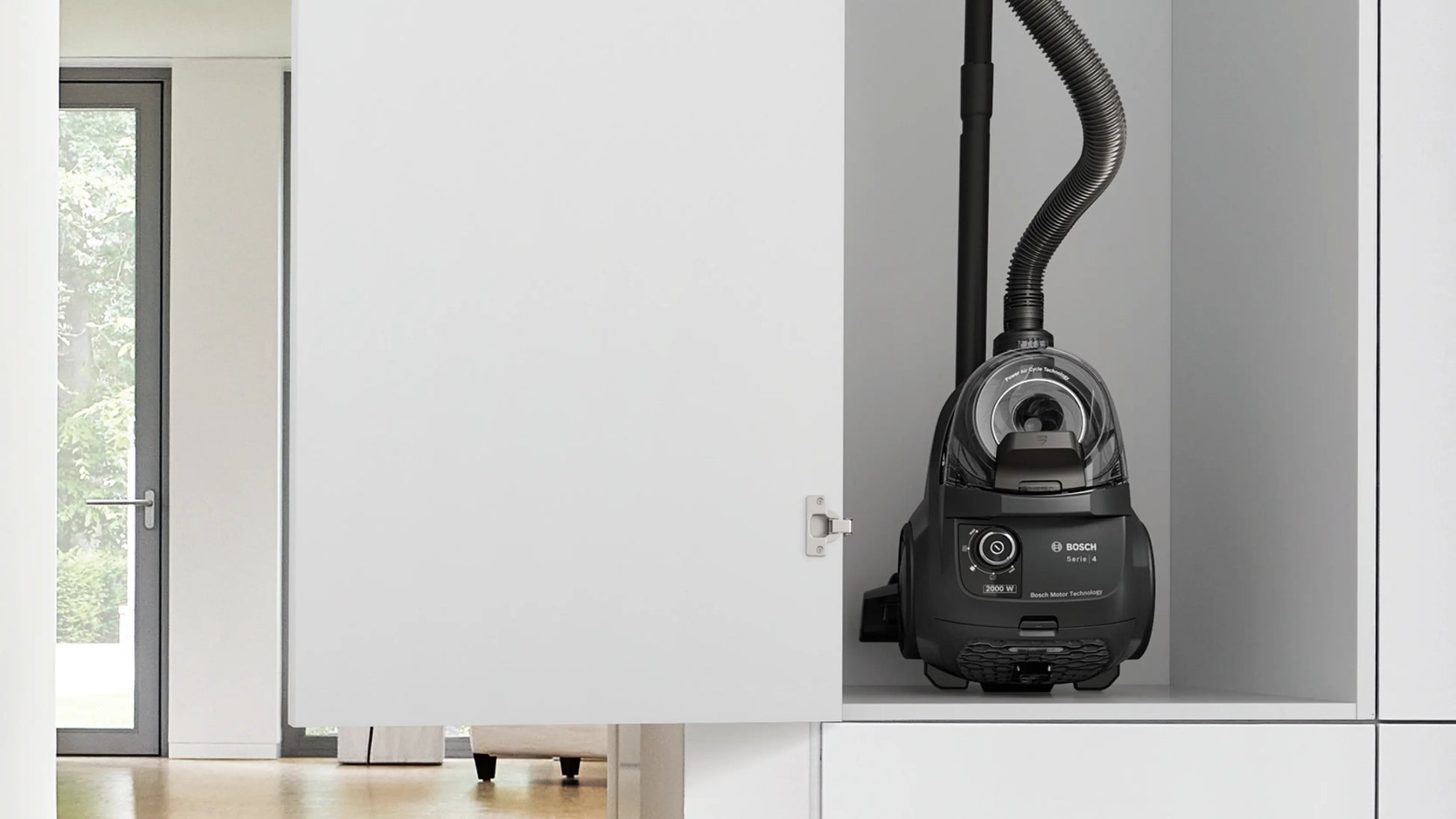 Bosch Serie 4 bagless vacuum cleaner in use on carpet